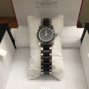 Tissot women’s watch with black face. Brand new